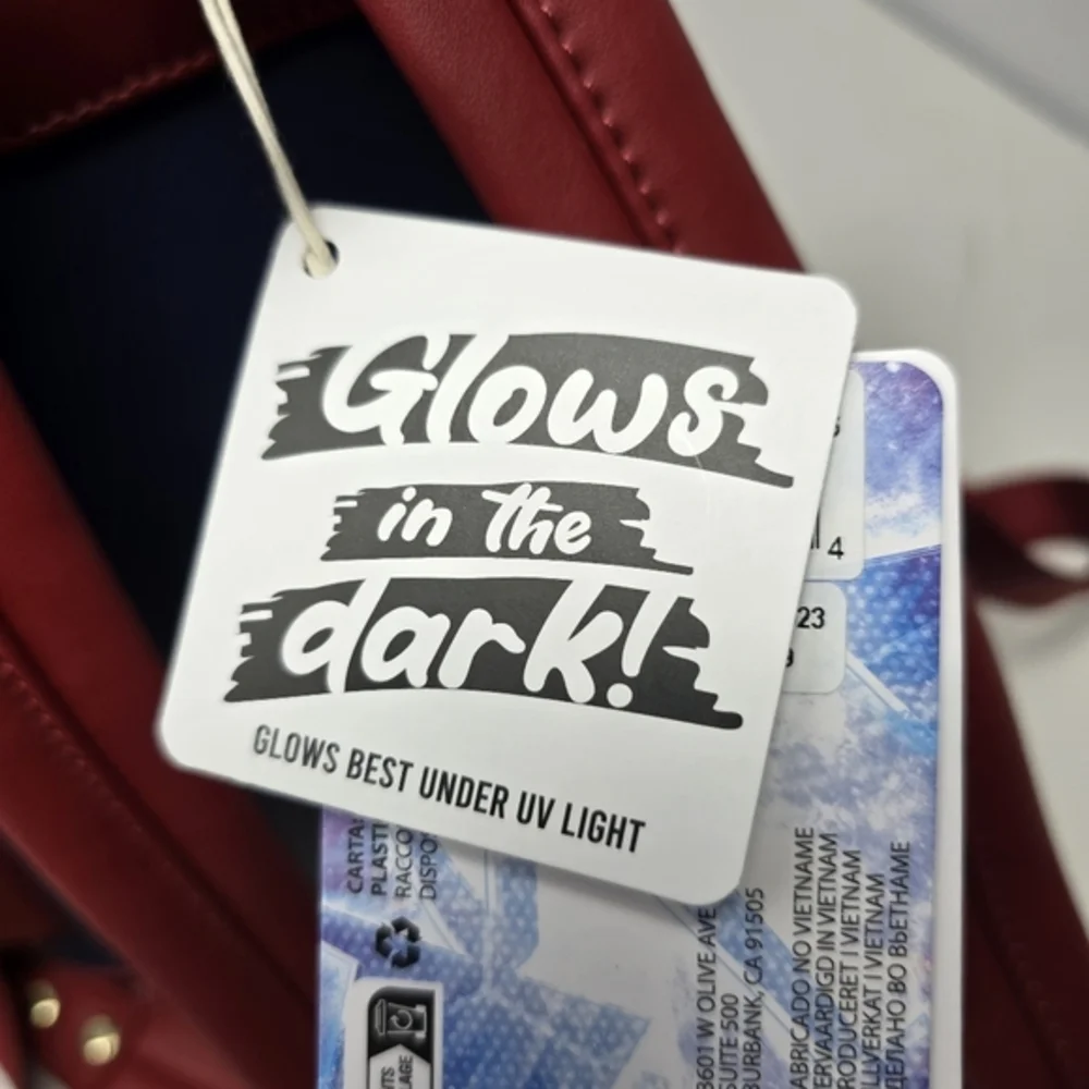NWT Loungefly The Marvels Glow In The‎ Dark Mini Backpack Disney Marvel Studios.